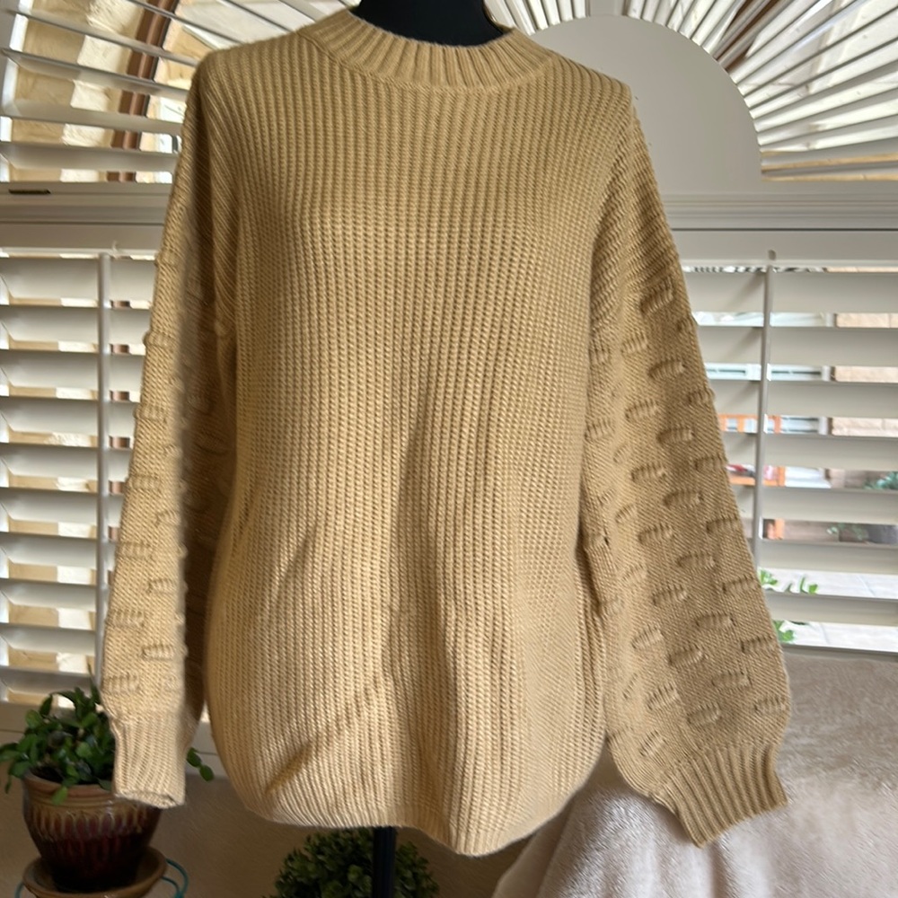 Dark tan sweater.  Size L